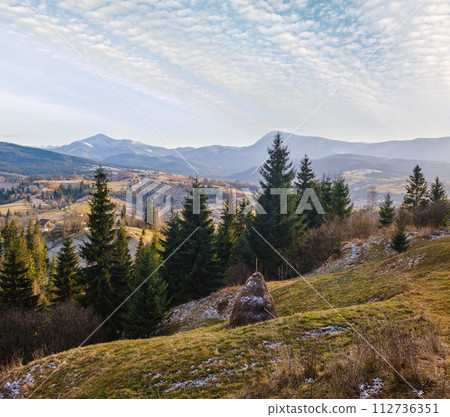 Late autumn mountain scene. Picturesque traveling, seasonal, nature and countryside beauty concept scene. Carpathians, Ukraine. 112736351