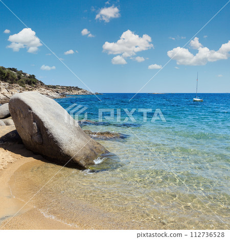 Big boulder on beach. Summer sea view (Valti, Sithonia, Halkidiki, Greece). Big boulder on beach. Summer sea view (Valti, Sithonia, Halkidiki, Greece). 112736528