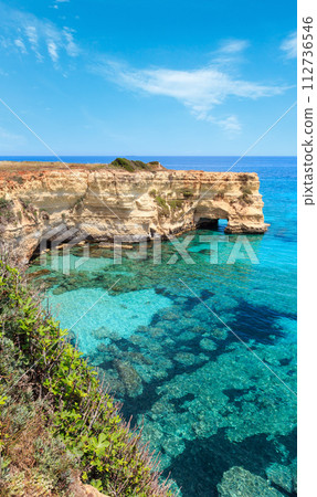 Faraglioni at Torre Sant Andrea, Italy 112736546