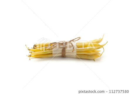 Bunch of flat runner bean pods heap isolated on white background. . Bunch of flat runner bean pods heap isolated on white background. . 112737580