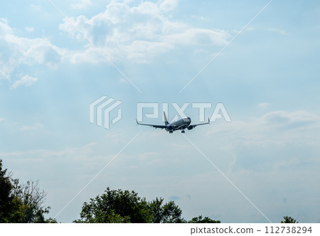 Airplane Coming in for Landing 112738294
