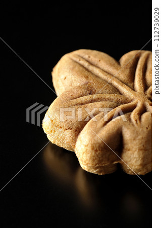 Momiji Manju is photographed against a black background Momiji Manju is photographed against a black background 112739029