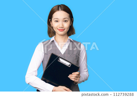 A woman with a document 112739288