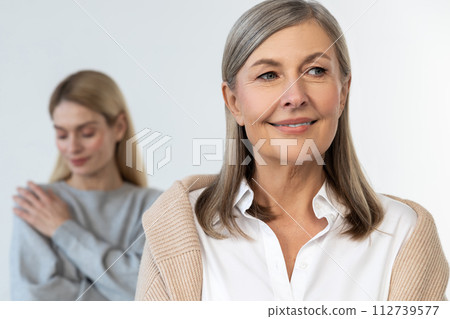 Good-looking mature woman looking confident and determined Good-looking mature woman looking confident and determined 112739577