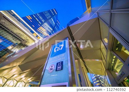 Tokyo cityscape in Japan View of Toranomon Hills Station Tower, which opened today. On the right is the Glass Rock building (night view) 112740392
