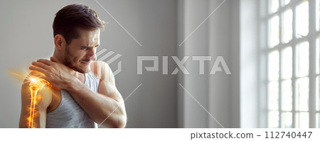 AI-generated content. Pain concept - man suffering from shoulder pain, pain is visualized as glowing bones 112740447