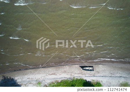 Empty old wooden boat 112741474