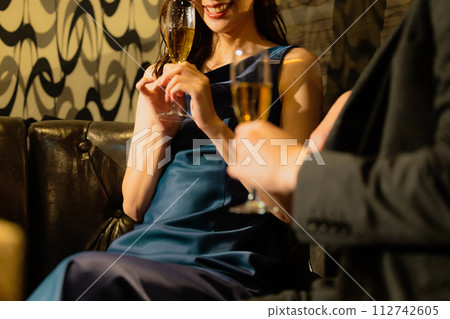 Couple drinking champagne Couple drinking champagne 112742605