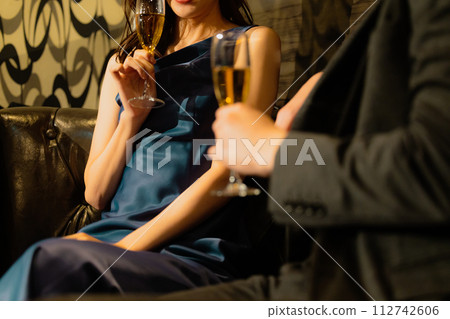Couple drinking champagne Couple drinking champagne 112742606