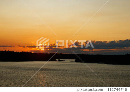 Magical sunset over the Gulf of Finland, Baltic sea. View from the ship Magical sunset over the Gulf of Finland, Baltic sea. View from the ship 112744746