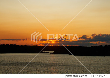 Magical sunset over the Gulf of Finland, Baltic sea. View from the ship 112744748