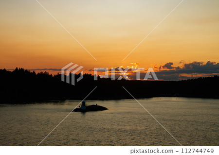 Magical sunset over the Gulf of Finland, Baltic sea. View from the ship 112744749