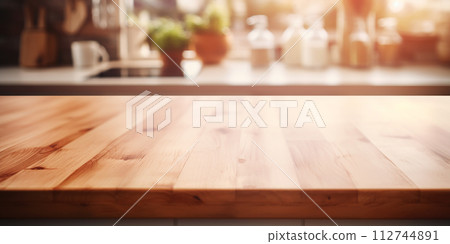 Photorealistic image of a clean wooden table in the kitchen, the sun is shining through the window. 112744891