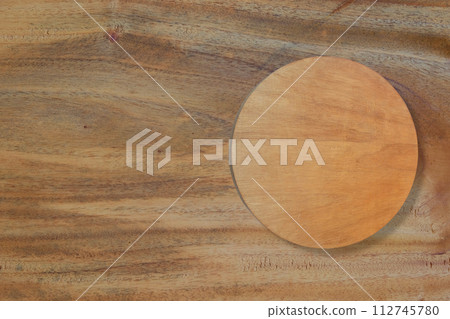 Empty round wooden table top vintage style put on wooden plank background Empty round wooden table top vintage style put on wooden plank background 112745780