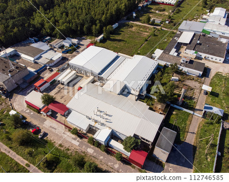 Aerial view of a busy industrial factory complex Aerial view of a busy industrial factory complex 112746585