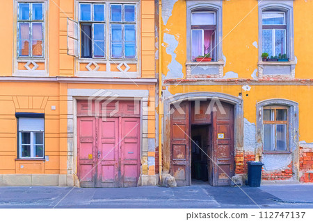 Colorful facade of an old historical residential building in the Hungarian city of Sopron Colorful facade of an old historical residential building in the Hungarian city of Sopron 112747137