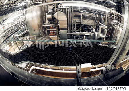 Beer bottling conveyor belt in brewing factory 112747793