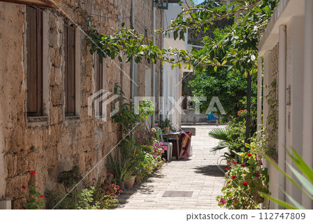 Cozy pedestrian street in the old town of Famagusta. Cyprus Cozy pedestrian street in the old town of Famagusta. Cyprus 112747809