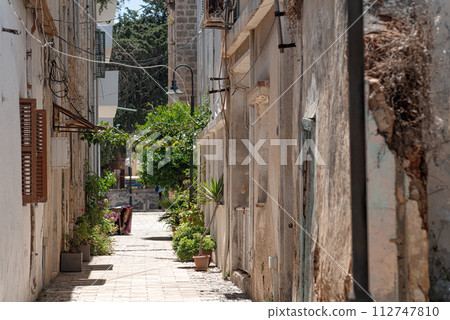 Cozy pedestrian street in the old town of Famagusta. Cyprus Cozy pedestrian street in the old town of Famagusta. Cyprus 112747810