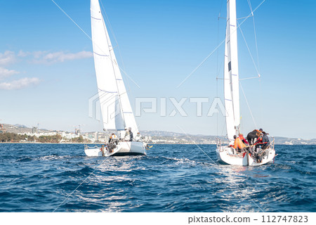 Sailing regatta competition in early morning Sailing regatta competition in early morning 112747823