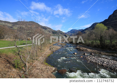 Talvera, river in South Tirol, Italy. View from Bolzano. Talvera, river in South Tirol, Italy. View from Bolzano. 112748732