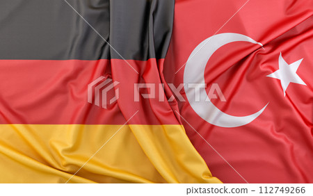 Ruffled Flags of Germany and Turkey. 3D Rendering 112749266