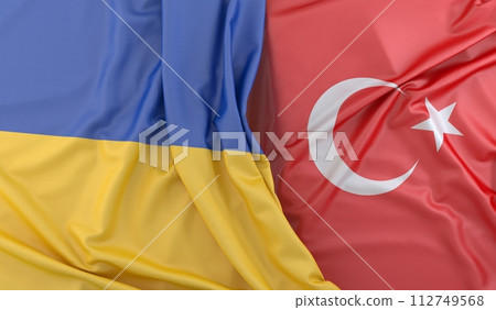 Ruffled Flags of Ukraine and Turkey. 3D Rendering Ruffled Flags of Ukraine and Turkey. 3D Rendering 112749568