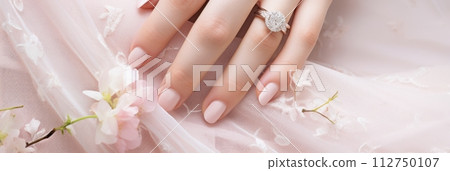 Wedding nail design of the bride, beautiful hands of the bride with well-groomed manicure, banner Wedding nail design of the bride, beautiful hands of the bride with well-groomed manicure, banner 112750107