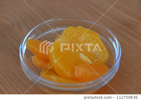 fresh peeled orange 112750636