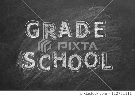GRADE SCHOOL. Text on blackboard. 112751111