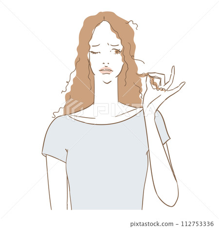 Beautiful woman suffering from frizzy or damaged hair Beautiful woman suffering from frizzy or damaged hair 112753336