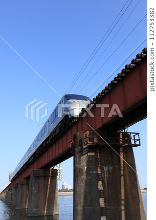 Local line, Oyodogawa Bridge, new limited express 783 series, hyper saloon and blue sky Local line, Oyodogawa Bridge, new limited express 783 series, hyper saloon and blue sky 112753382