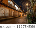 Old Japanese townscape illuminated at dusk 112754569