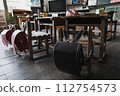 Old school building and school bags 112754573