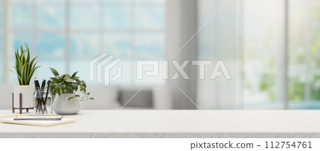 A white tabletop with a space for display products and decor in a modern bright living room. 112754761