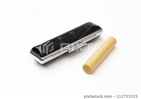 Seal and seal case on white background Seal and seal case on white background 112755525