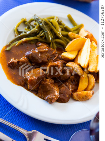 Veal stew with vegetables Veal stew with vegetables 112756287