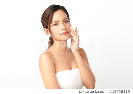 Beautiful young asian woman with clean fresh skin on white background, Face care, Facial treatment, Cosmetology, beauty and spa, Asian women portrait. Beautiful young asian woman with clean fresh skin on white background, Face care, Facial treatment, Cosmetology, beauty and spa, Asian women portrait. 112756319