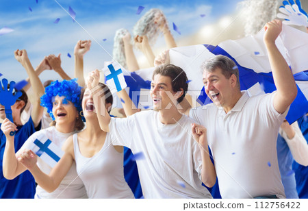 Finland football team supporter on stadium. Finland football team supporter on stadium. 112756422