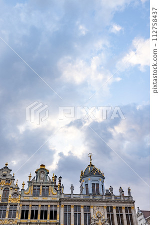 BRUSSELS, BELGIUM, June 23, 2023: Grandeur of the Gilded Maison du Roi Against a Cloudy Sky 112758437