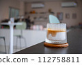 The Coffee Menu called Dirty Coffee a Glass of Ristretto Coffee shot on Cold Milk 112758811