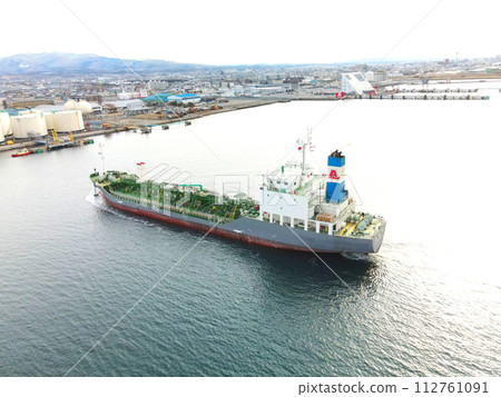 Photographing a cargo ship entering Hakodate Port, Hakodate City, Hokkaido in early spring 112761091