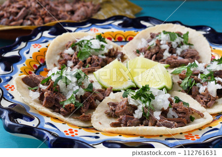 Mexican barbacoa beef tacos and beef barbacoa Mexican barbacoa beef tacos and beef barbacoa 112761631