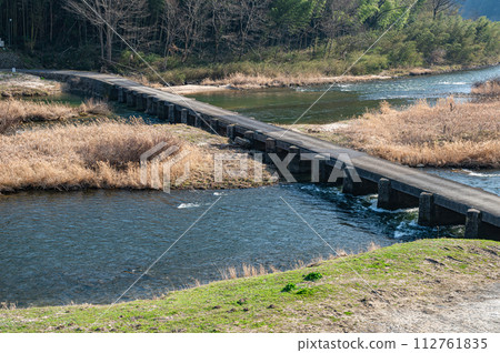 Koiji Bridge, a submerged bridge over the clear Kizugawa River in Kyoto, Minamiyamashiro Village, Kyoto Prefecture Koiji Bridge, a submerged bridge over the clear Kizugawa River in Kyoto, Minamiyamashiro Village, Kyoto Prefecture 112761835