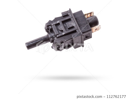 brake light switch under the brake pedal in a car on a white isolated background. catalog of spare parts for websites and advertising. 112762177