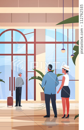 tourists with luggage departing from business trip standing at reception desk in hotel lobby recreation travel check-in concept 112762585