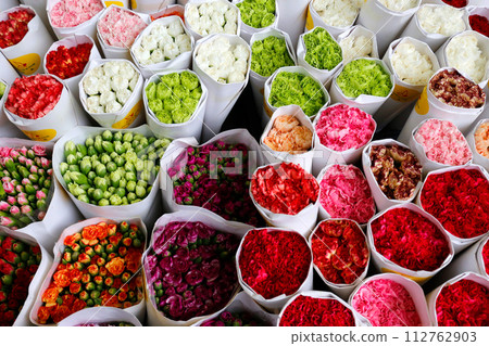 Colorful flowers lined up at a flower shop 112762903