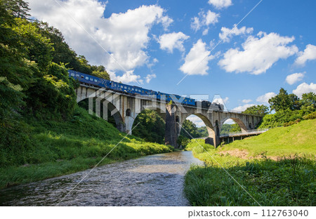 Steam locomotive running on Megane Bridge in Tono Steam locomotive running on Megane Bridge in Tono 112763040