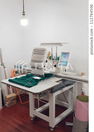 embroidery machine for hobby or work at home 112764506