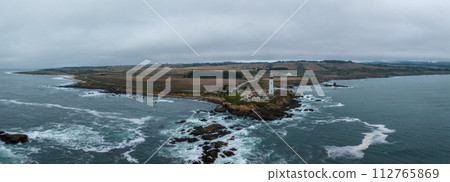 Pigeon point lighthouse. Aerial view of the lighthouse on top of the Cliff in California, USA. 112765869